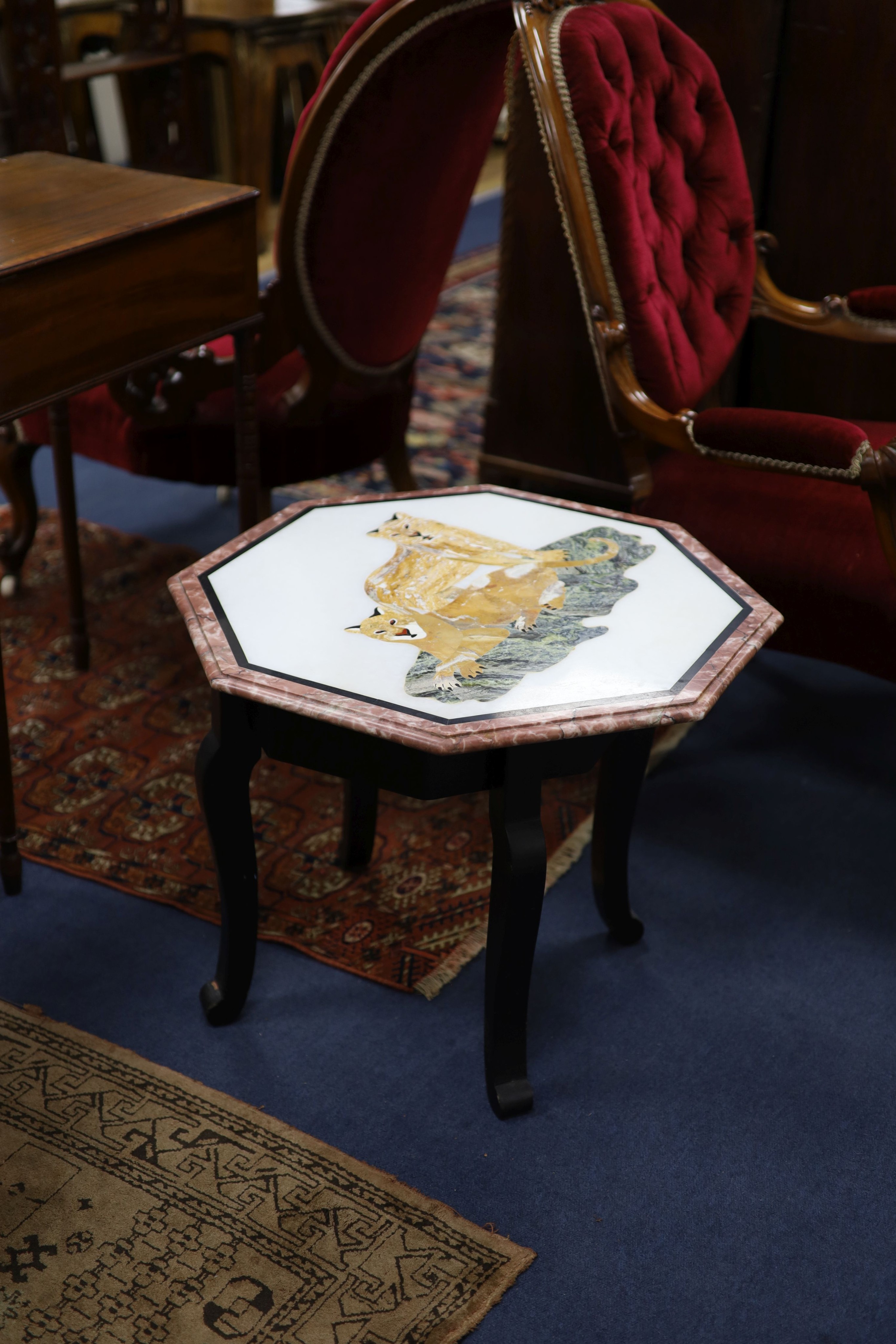 An octagonal hardstone inlaid occasional table, width 57cm, height 47cm